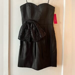 Love Carmen - Carmen Marc Volvo- black strapless mini dress with sequin bow